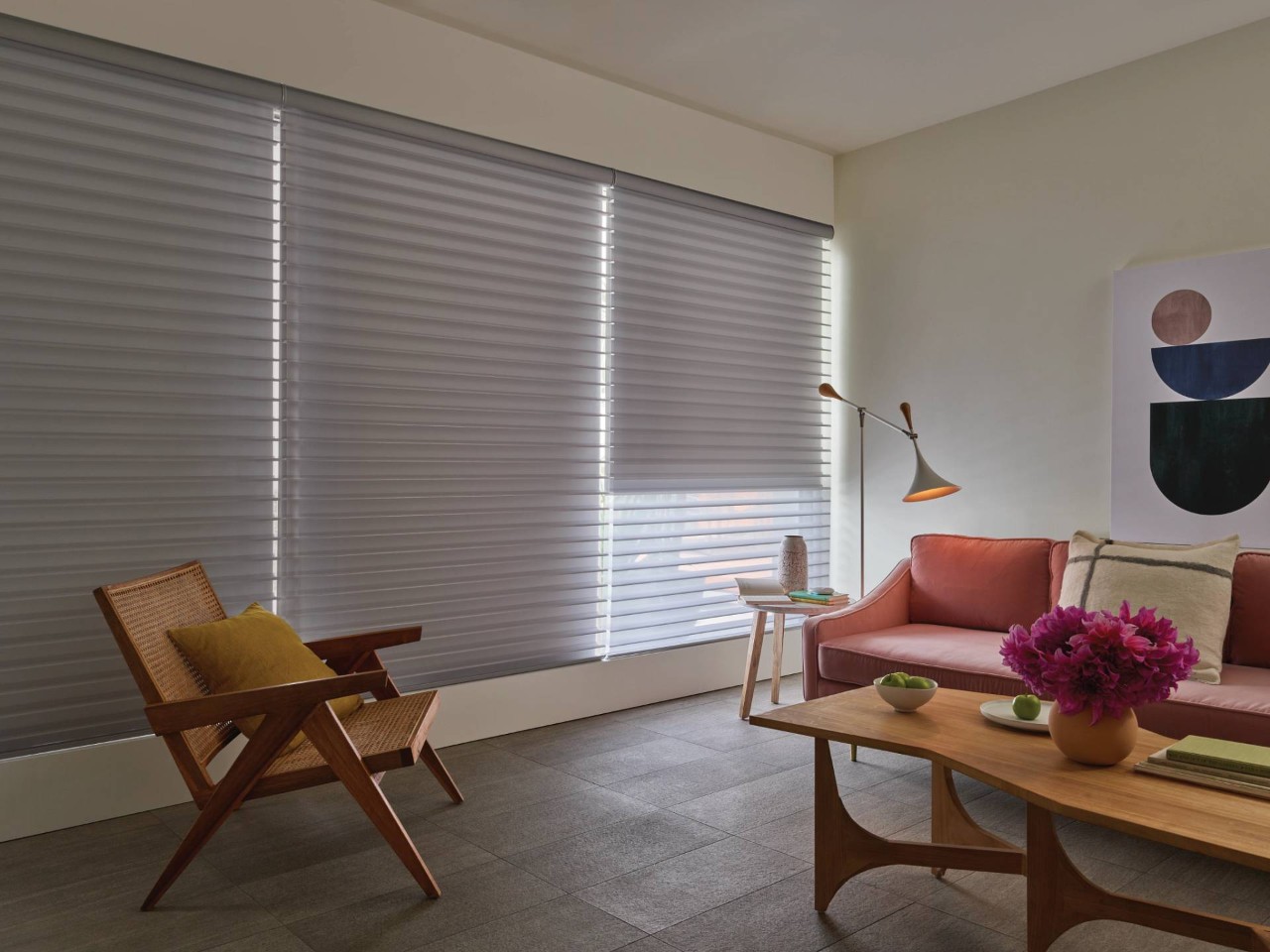 Hunter Douglas shades equipped with PowerView® Automation hanging in sitting room windows near Anchorage, AK